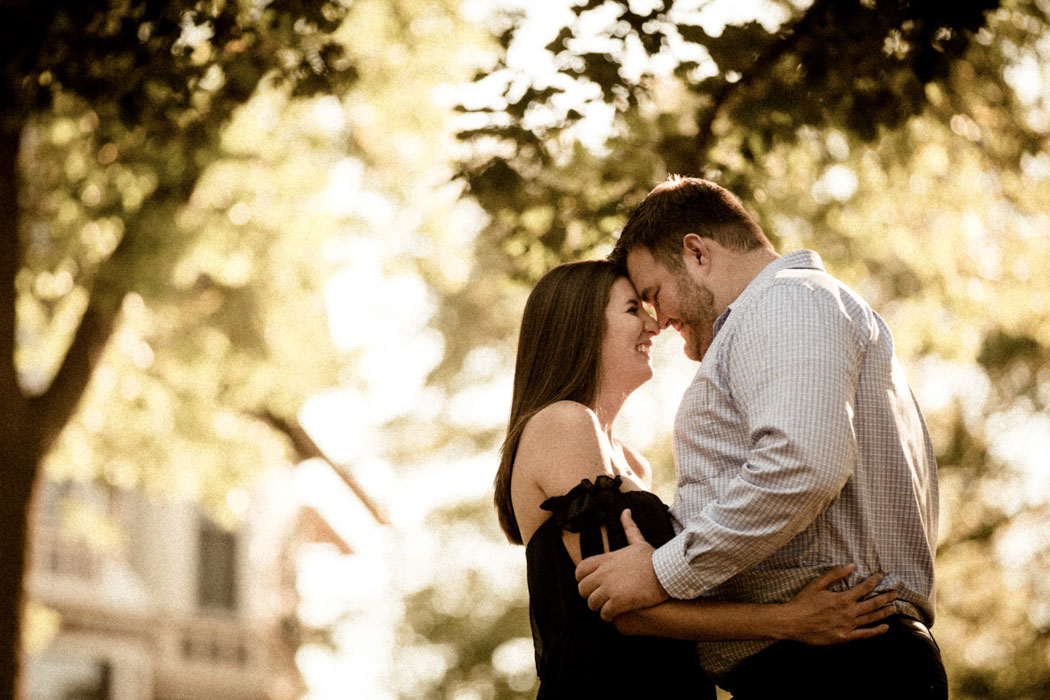 a man and woman hugging outside
