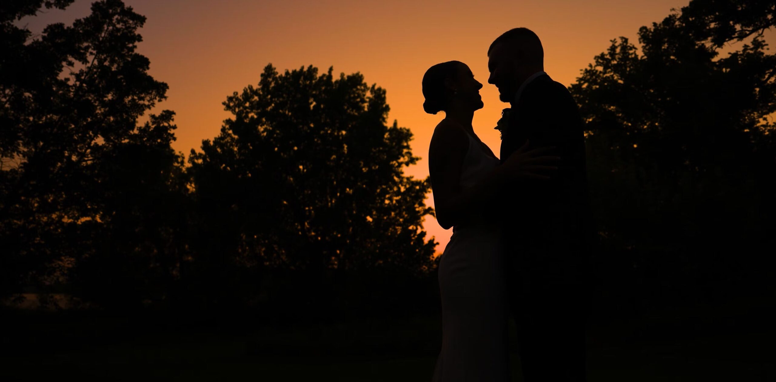 a silhouette of a man and woman