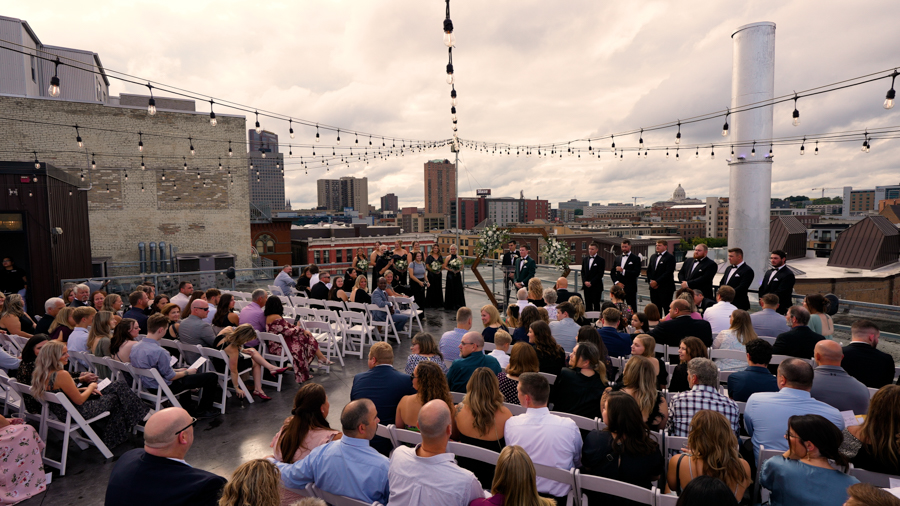 a group of people sitting on a roof